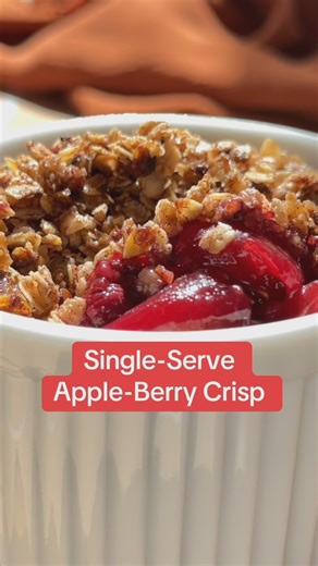 End the year on a sweet note with this easy, cozy Apple-Berry Crisp for one. Is it dessert? Yes. Could it be breakfast? Also yes. With lots of fiber (13 grams!!) from the apple, berries, and oats, it’ll keep you fuller, longer. Find the full Single-Served Apple-Berry Crisp recipe here: https://bit.ly/3DkXsZA | WeightWatchers