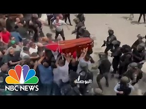 Violence Erupts At Funeral For Palestinian Journalist Killed Covering Israeli Military Raid
