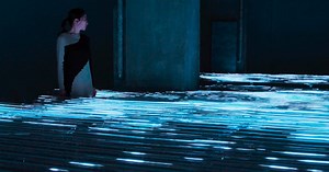 'waves of code' light installation explores media reflexivity and aesthetics in the digital age