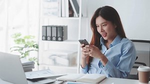 clip-3534683695-excited-businesswoman-celebrates-successful-news-on ...