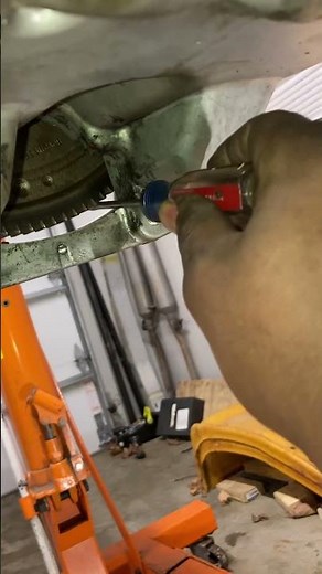 Tighten Crank Pulley Bolt with Crankshaft Holder Tool