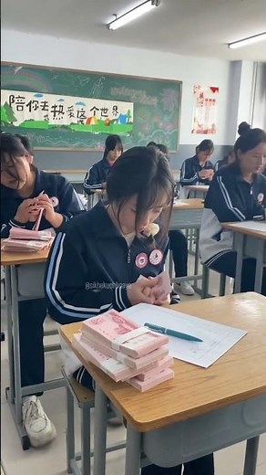 Chinese students learn how to count money!