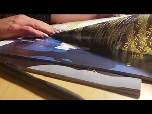 ASMR- Magazine flipping- extremely close up- no speaking
