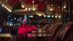 Waiter at work in a french restaurant at night
