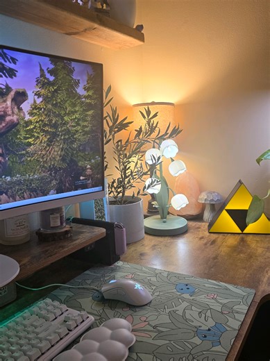 Hello Mage Friends ✨️ Happy Friday! I love adding plants to my setup. I've wanted an olive tree for a while now, I love the delicate leaves! What kind of plants do you have in your setup? 🥰✨️🪴🌿 You can find cozy gaming merch on our website mageapparel.com ✨️ #mageapparel #cozygaming #cozygamer #instagaming #gamergram