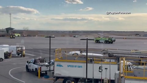 American Airlines plane catches fire at Denver airport