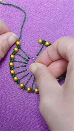 Hand stitching green thread with golden beads pattern #construction #popular