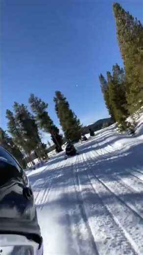 Driving snowmobiles through Colorado’s Snowy Mountains