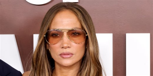 Jennifer Lopez Stuns in a Flirty Little Red Dress With a Plunging Neckline and Throwback Accessories