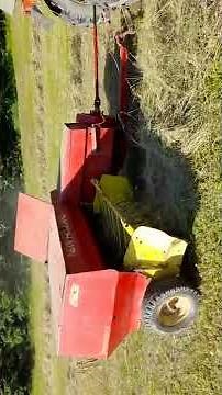 New Holland 270 square baler in action
