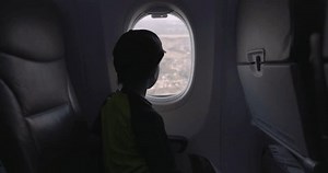 Young Boy Looking Out Airplane Window Stock Footage Video (100% Royalty-free) 3477024615 | Shutterstock