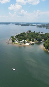 1K views · 12 reactions | Discover this modern estate on Lake Norman, designed by Elite Design Group and built by Grandfather Homes. With 9,700+ sq ft of chic, transitional elegance, enjoy 300’ of waterfront, a sandy beach, and seamless indoor-outdoor living. Perfect for serene escapes and stylish gatherings. ✨ Presented by Josh Tucker & Joey Adams | Corcoran HM Properties @josh.tucker.7505 @luxuryhomemagazineclt | Luxury Home Magazine | Facebook