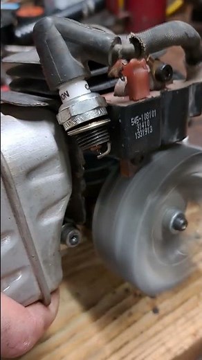 Ignition system demonstrated. Sparkplug, coil,and flywheel generator