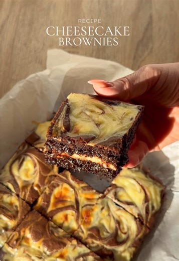 Cheesecake brownie recipe with soft cream 🍫 Ingredients : Cream cheese layer - 200g Philadelphia cream cheese - 1 egg - 40g sugar Brownie layer : - 140g butter - 1 tablespoon oil - 60g cocoa powder - 150g white sugar - 50g brown sugar - 3 eggs - 90g flour - 1 pinch of salt - 70g dark chocolate - 30g chopped chocolate Recipe : For the brownie layer: In a bowl, melt the butter and add the cocoa powder, melted chocolate, and oil. Mix and let cool. In another bowl, whisk the eggs and brown sugar, t