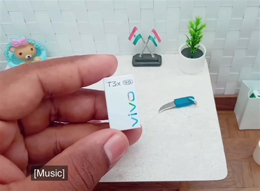 Discover the New Smallest Mini Mobile Phone