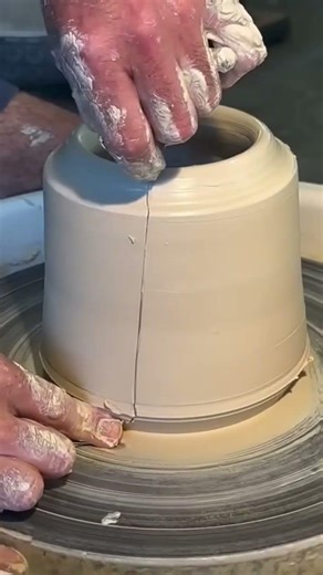 Making a clay vase using machine-assisted shaping process