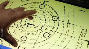 Hand checks electrical diagram on the touchscreen. A circuit diagram (electrical diagram, elementary diagram, electronic schematic) is a graphical representation of an electrical circuit.
