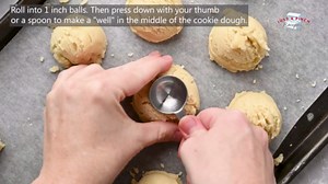 Raspberry shortbread cookies with a white chocolate drizzle