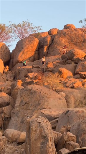 Nestled among ancient granite giants in the heart of Damaraland, Madisa Camp is a haven for wanderers seeking both serenity and adventure. From the boulder tops, the world stretches endlessly over the riverbed and golden savanna, while evenings bring the glow of lanterns, delicious dinners beneath the stars, and stories shared in true Namibian spirit. With its quirky charm, warm smiles, and effortless hospitality, Madisa Camp captures the wild romance of the desert and lingers in every traveller