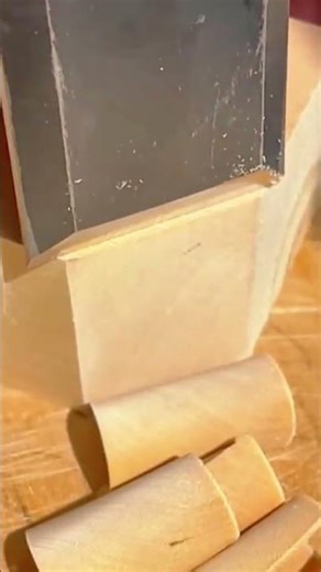 cutting and sculpting wood material to create detailed textures with professional carpentry tools