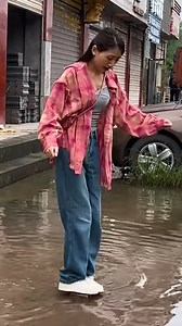 Guy helps his girlfriend walk through puddle! | Bloom