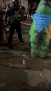 An ICE agent was seen pepper-spraying the rear end of a Portland protester wearing a frog costume, apparently aiming for the air intake valve. "This could have been really dangerous," the person who filmed the video wrote on X. | New York Post Health & Parenting