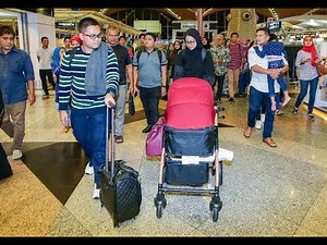 Cancer stricken baby Ainul Mardhiah leaves for London