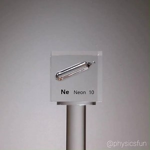 Element 10, Neon https://www.physicsfunshop.com/search?keywords=neon A pure sample of the famous noble gas in a glass ampule encased within a lucite cube. But how can we know that the glass tube is actually filled with neon gas? If the sample is brought near the 50,000 Volt high frequency electric field of a miniature Tesla coil, the gas will glow with the characteristic orange light from the electron energy transitions specific only to neon. Note that the glow deceases as the sample is moved aw