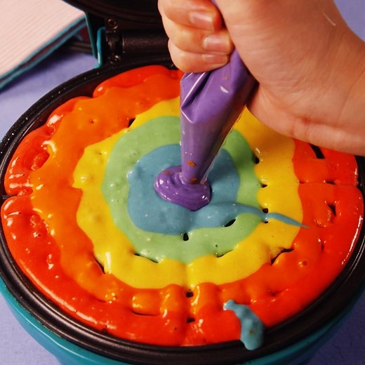 Rainbow Waffles are our favorite way to start our day. Full recipe: http://dlsh.it/rRVsMZ1 | Delish Kids