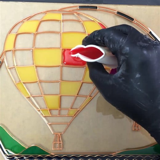 Love how this one looks in the window or outside. So easy to make. | Pour Away Fluid Arts