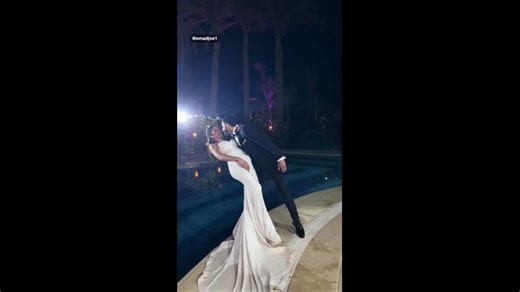 Groom drops bride into pool on wedding day