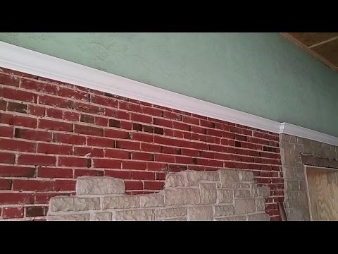 Install crown moulding on brick wall