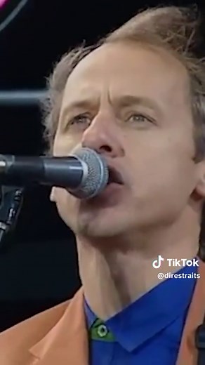 Dire Straits - Money For Nothing Live Knebworth (feat. Eric Clapton, Phil Collins)