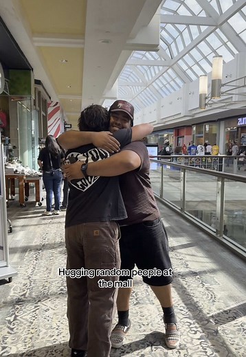 Hugging Random People: Spreading Love in Public Places