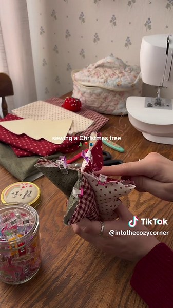 to make the template, I googled “Christmas tree outline” and chose one of the photos! I just traced it onto a Manila folder from my laptop screen, and proceeded to use it to cut out my 4 pieces of fabric 🎄❣️ #christmascrafts #holidaycrafts #christmascraft #sewinginspiration #christmasdiy