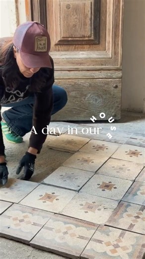 Testing the patterns on our old floor tiles, that we found underneath the staircase.