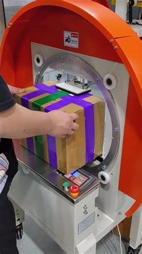 Automatic tape wrapping and sealing machine, the machine can wrap the tape around the entire..