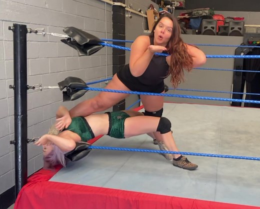 Blowing a Kiss | WWE Female Wrestler's Playful Gesture