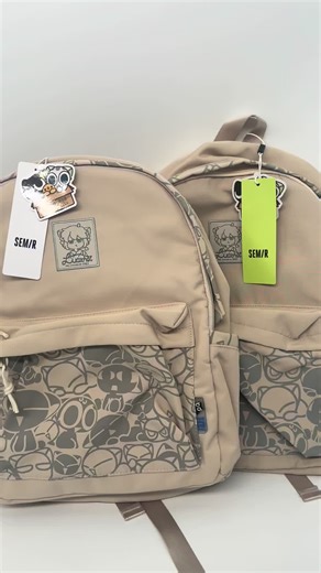 Stylish Beige Backpacks with Cartoon Character Design
