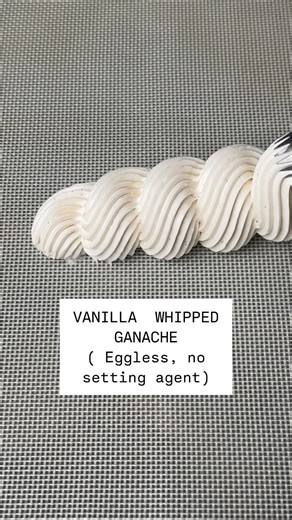 The best Whipped Vanilla Ganache (4 ingredients) 200g white chocolate, 355ml heavy whipping cream (divided)1 tsp vanilla extract 1 vanilla pod, scraped. Heat 200ml cream with vanilla pod seeds. Simmer, then let infuse 10–15 mins. Reheat and pour over chopped chocolate. Let sit 1–2 mins, stir until smooth. Add extract cold 155ml cream. Mix, then chill 4 hrs (or overnight). Whip till soft-medium peaks. Light, airy & full of real vanilla flavor—perfect for piping! | Yuvraj Dewan