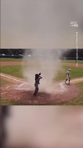 Umpire Saves Kid from Sudden Dust Devil During FL Baseball Game