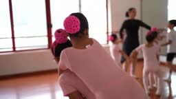 Girls ballet dancers carrying on shoulder at the dance studio
