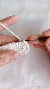 Standing double crochet (invisible start)" Explanation: Works just like a regular double crochet (dc) but doesn't leave a visible chain at the start. Technique: Yarn over (like a normal dc). Insert hook into stitch and complete the dc as usual. Pull the starting tail to tighten and eliminate the gap. Used for seamless rounds/rows where you want to avoid a ch-3 gap. Alternative names you might see: "chainless starting dc" or "no-chain dc start." ===================================================