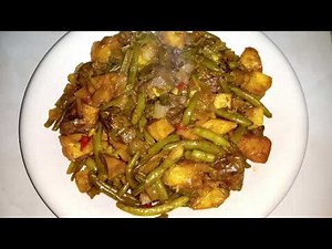 Haricots verts au foie sauté à l'oignon