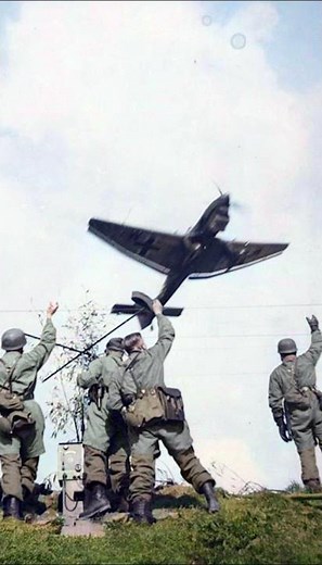 Amazing WW2 Image : Waving German Paratroopers Greet Low Flying Stuka Bombers
