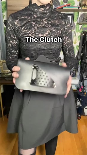 Looking for the perfect clutch? This handcrafted full grain leather clutch is minimalist and functional, and yeah, it’ll hold all your essentials for the night, but it is first and foremost a wearable piece of art. It’s a clutch that you’ll want to wear while you’re dancing, instead of a cute necessity that’s kind of in the way. Shown in satin black leather with silver spikes studs, The Clutch is also available in both matte and satin leather without studs, and gold spikes are available as well!