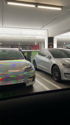 Little Fiat makes huge pops - holographic silver Tesla Model 3