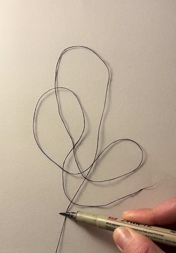 Unexpected Art from Pulling a Thread Through Paper