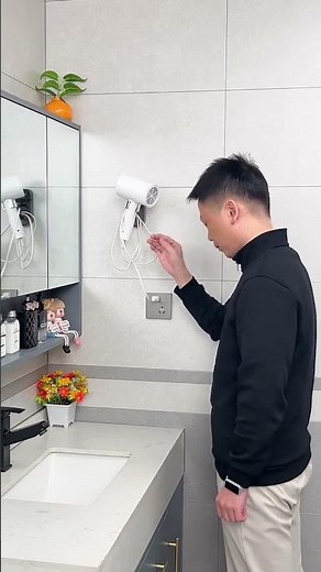 Installing this suction cup hair dryer holder in your home allows you to easily reposition