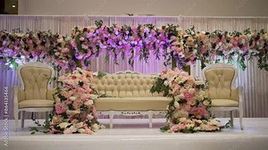 An amazing shot of a gorgeous stage set up at a traditional wedding.